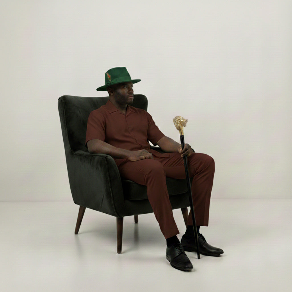 Solid hunter green wool felt crushable fedora hat with a feather accent, part of the Brooklyn Collection.