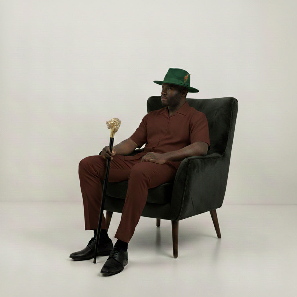 Solid hunter green wool felt crushable fedora hat with a feather accent, part of the Brooklyn Collection.