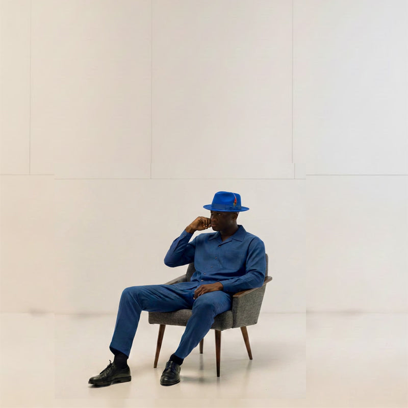 Solid Royal Brooklyn Collection Wool Felt Crushable Fedora with Feather Accent.