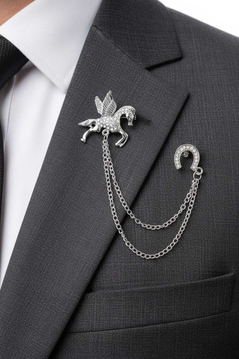 Elegant lapel pin with chain on a gray suit jacket