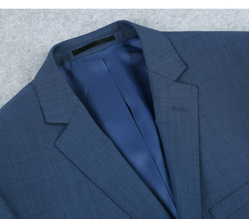 Solid blue wool single-breasted 2-button suit jacket collar, button, and pocket.