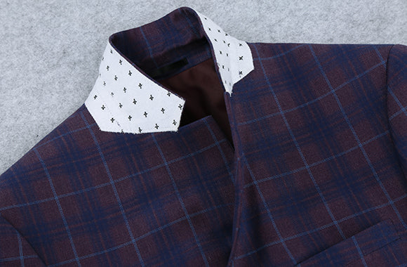 Close-up of the collar, button, sleeve, and pocket on the Renoir Slim Fit Blazer Glen Plaid in Blue.