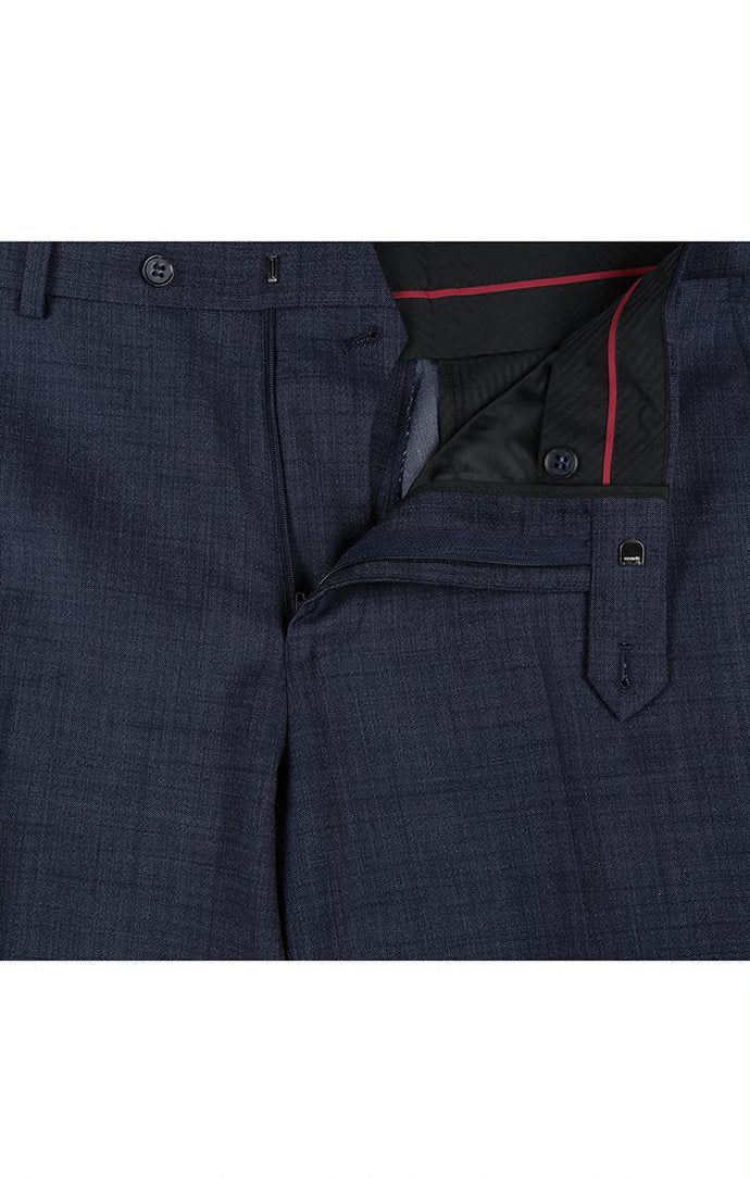 Close-up view of a solid pocket on the jacket of the Renoir Wool Blend Regular Fit Suit 2 Piece Suit 2 Button in Navy.