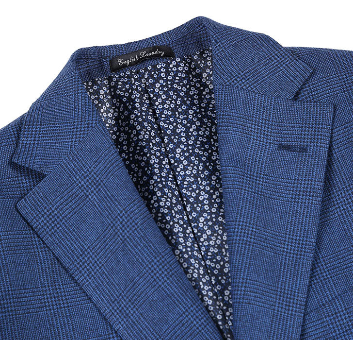 English Laundry Blue Checked Slim Fit Suit Wool Blend jacket showing checkered fabric, collar, buttons, and pocket.