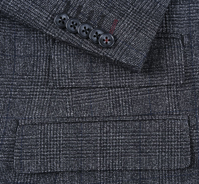 Close-up of a button on the charcoal checkered English Laundry Slim Fit Suit 100% Wool, showing the collar and pocket.