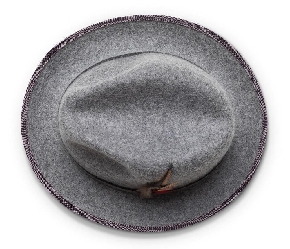 Solid wool felt dress hat with 2 ¼ brim, gray with red bottom, featuring a feather accent.