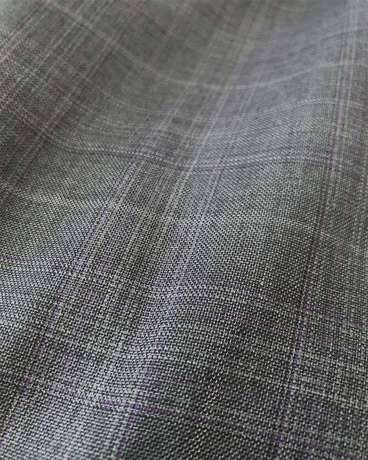 Detailed close-up of the gray Glen Plaid checkered fabric for the Pompey Collection Men's 2 Piece Regular Fit Dress Suit.