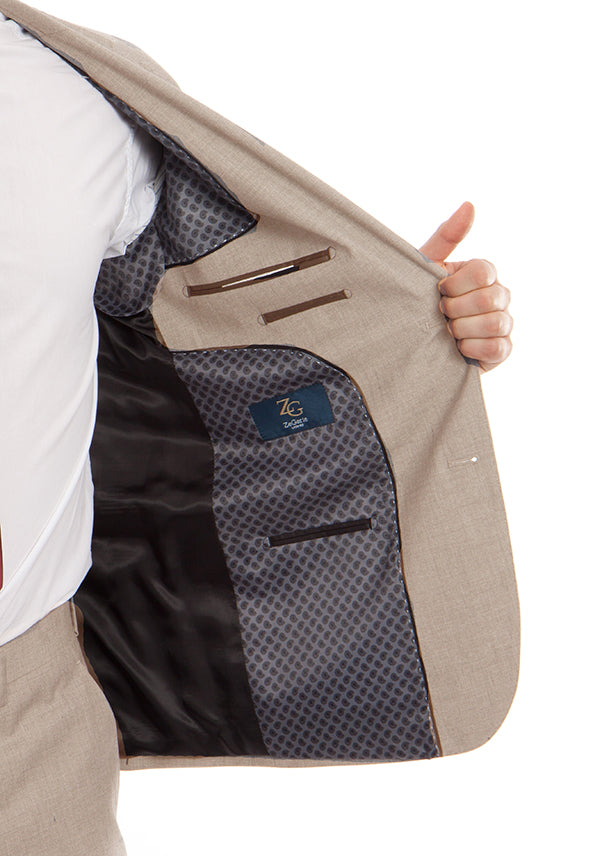 Solid tan 100% Wool Modern Fit Italian Style 2 Piece Tazio suit jacket showing collar, buttons, and pocket details.