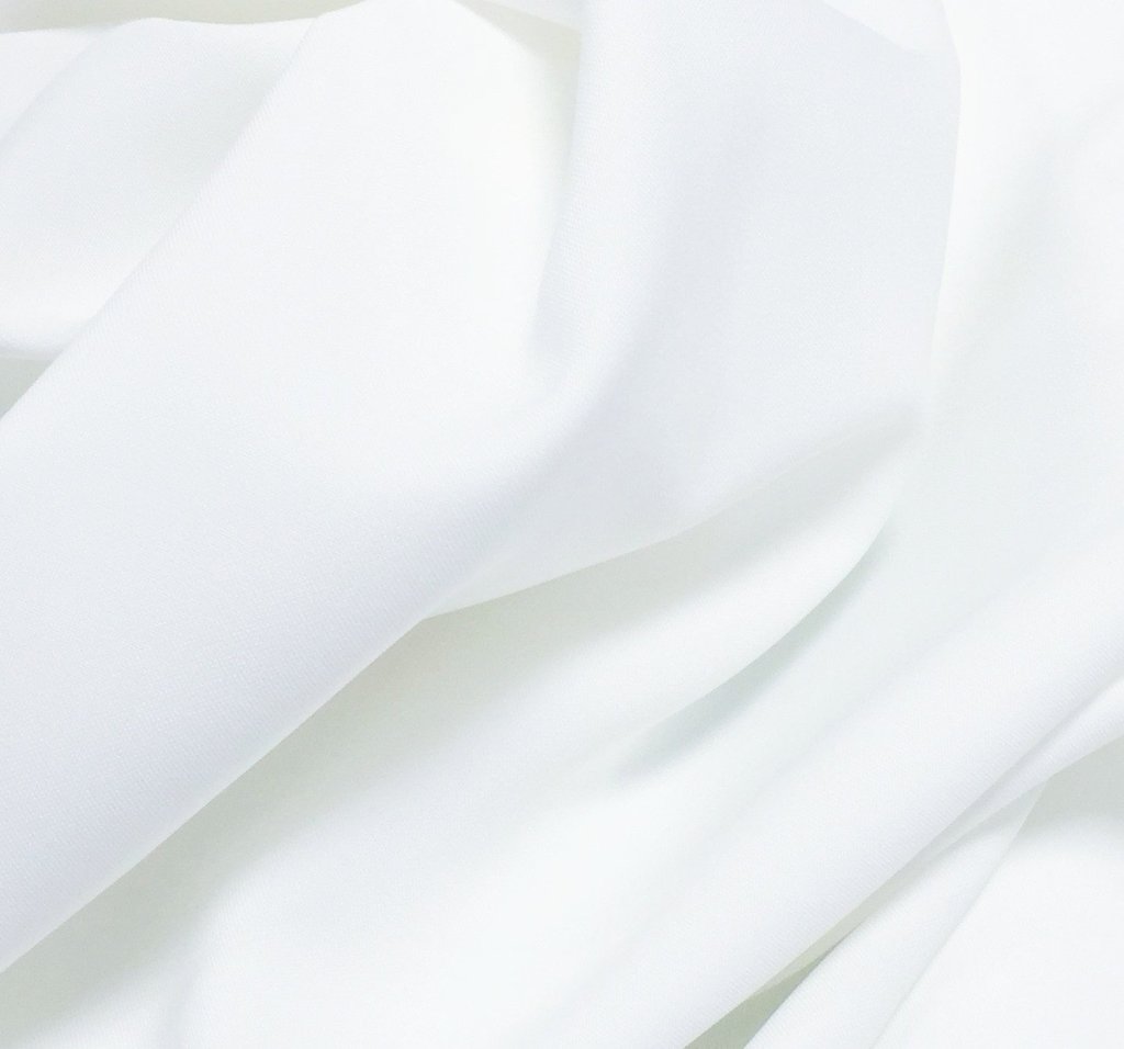 Close-up of solid white fabric weave for Regular Fit White 2 Piece Tuxedo With Slim Satin Lapel.