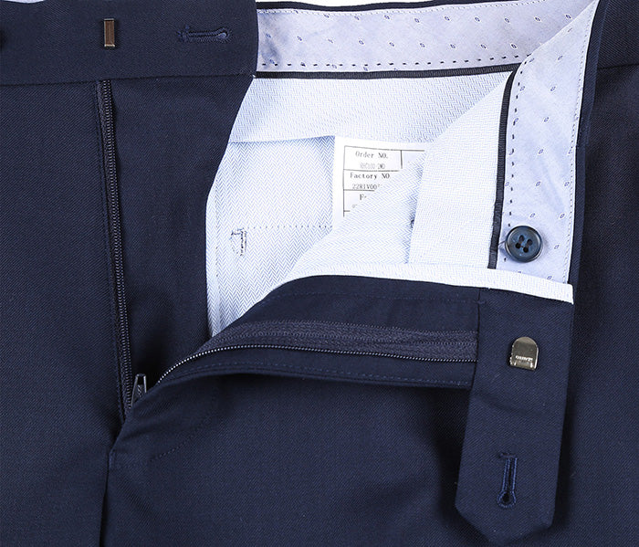 Close-up of the solid navy pocket on the Renoir Half Canvas Stretch Wool Dress Suit Modern Fit 2 Piece jacket.