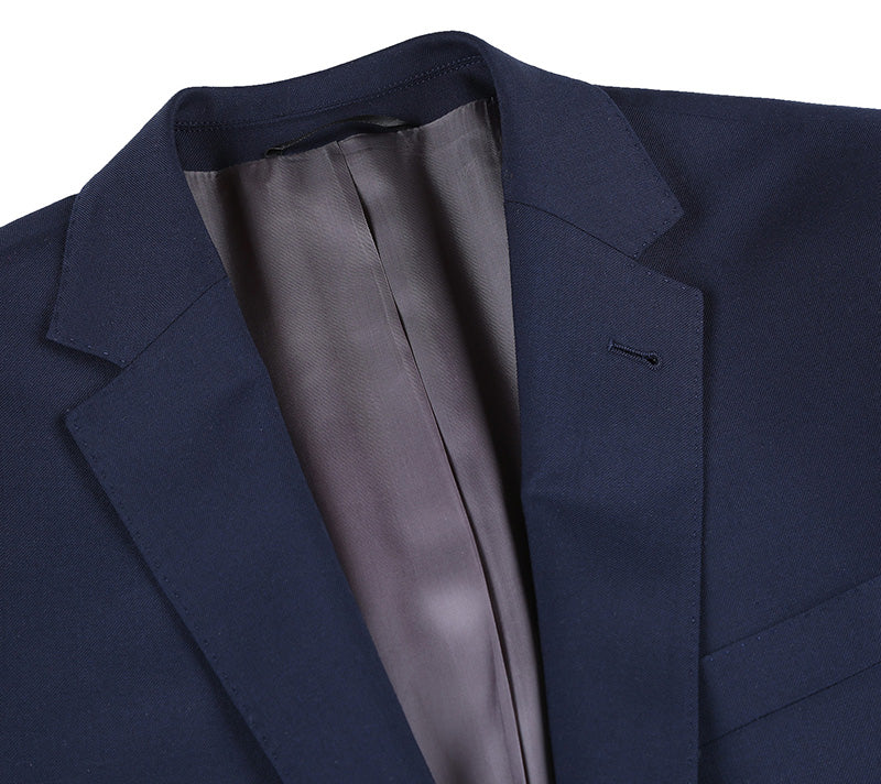 Close-up of the solid Half Canvas Stretch Wool Dress Suit Modern Fit 2 Piece in Navy jacket collar, button, and pocket.