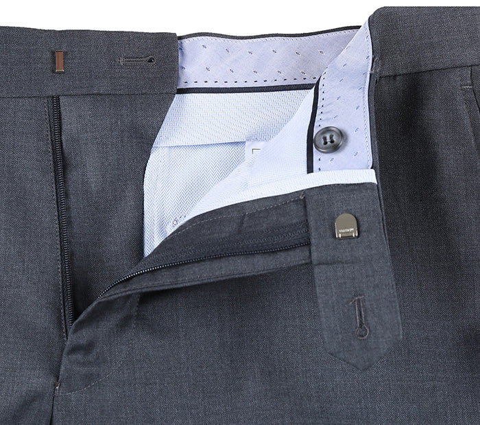 Close-up of a solid pocket and button on the Half Canvas Wool Dress Suit Modern Fit 2 Piece in Gray jacket.