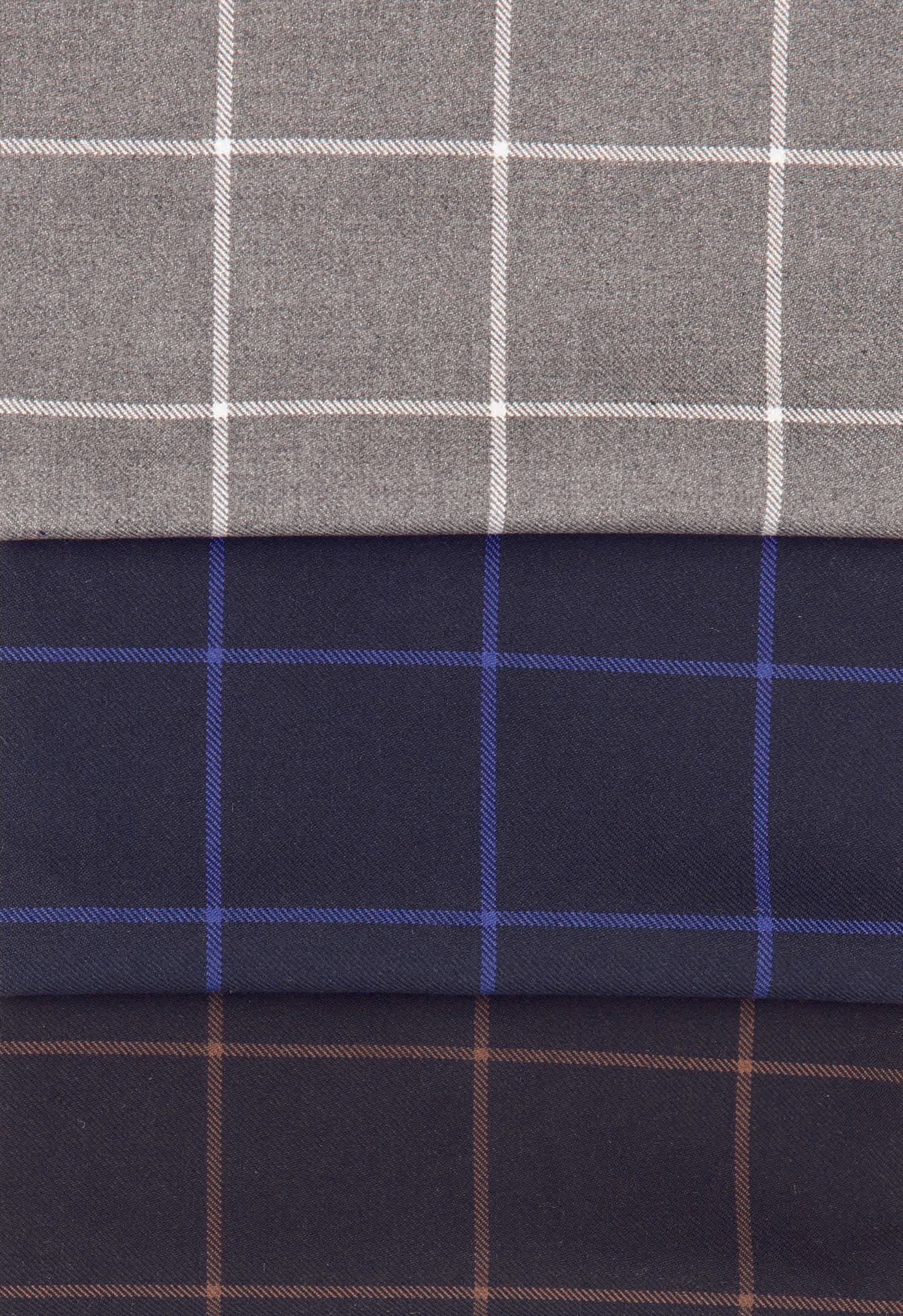 Close-up of navy window pane checkered fabric for Slim Fit Fashion Jacket.