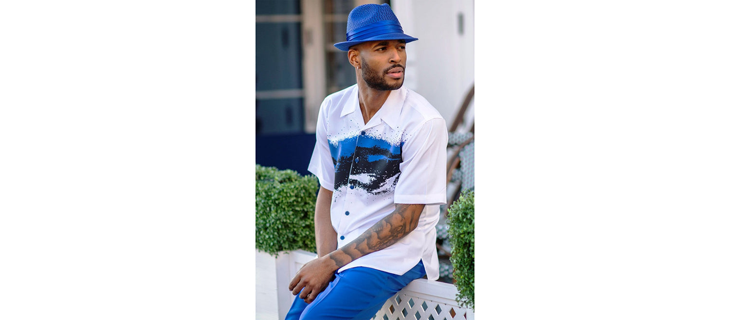 man wearing white and blue walking suit and blue fedora