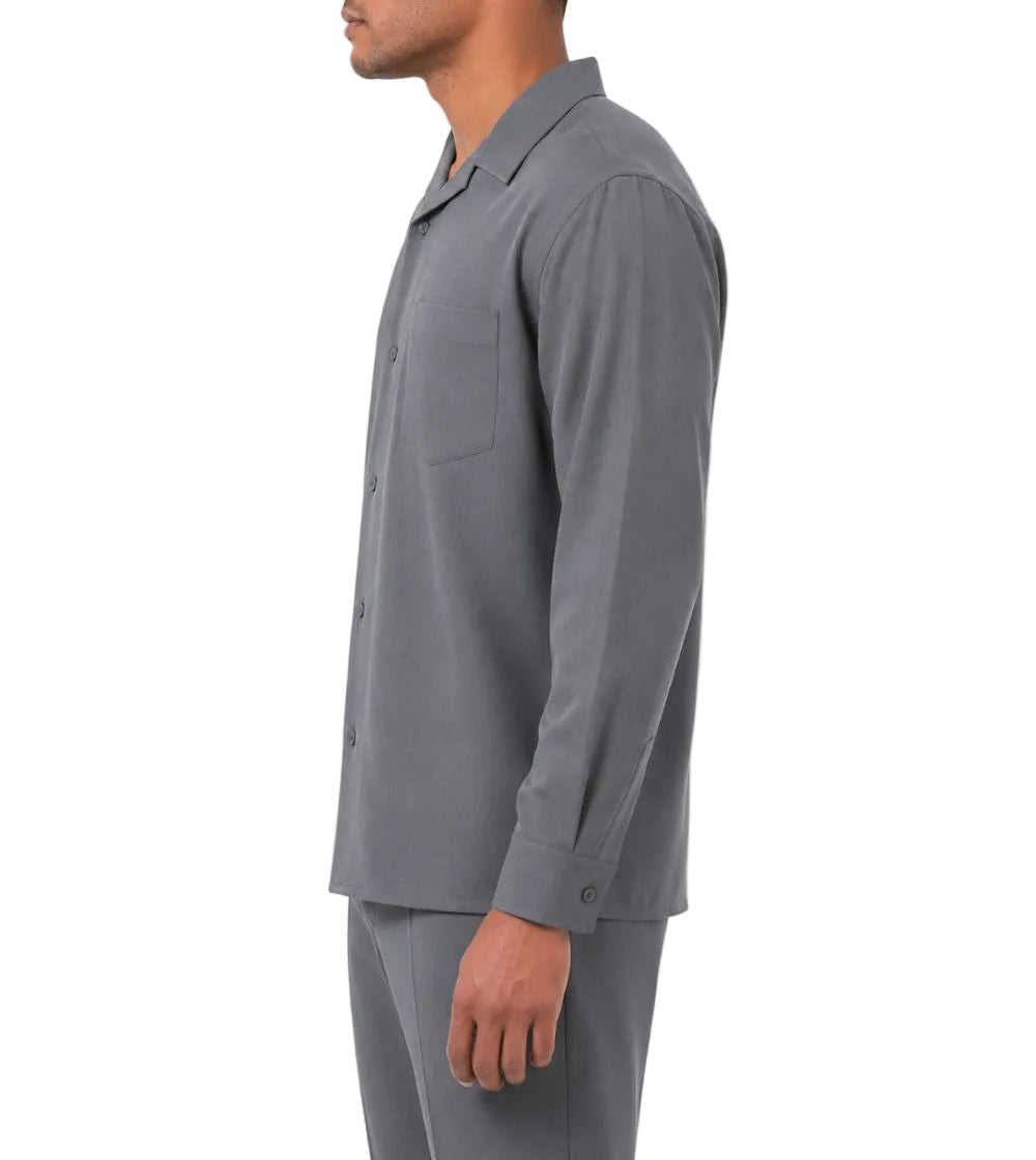 Gray shirt worn by a person on a white background