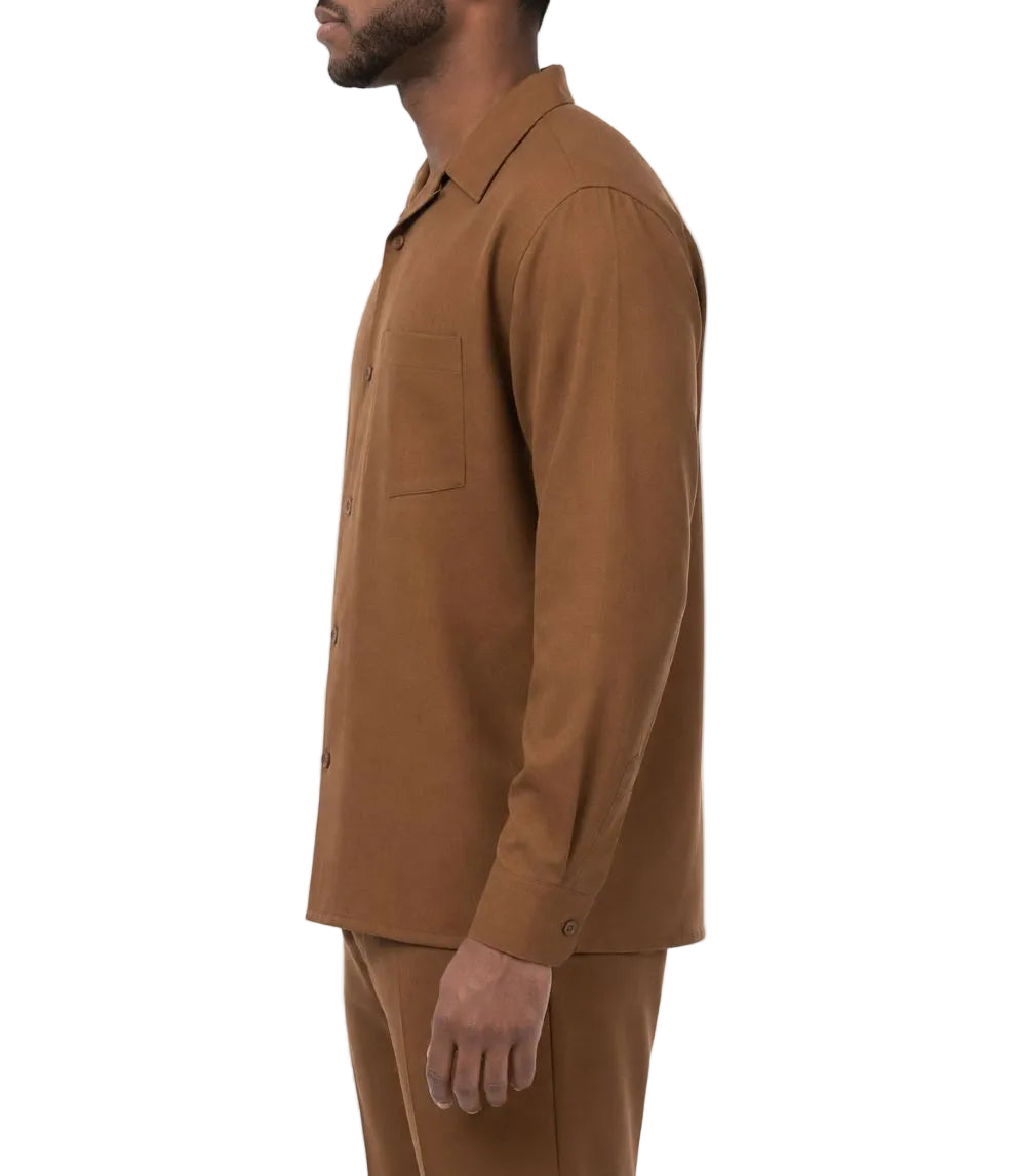Man wearing a Taupe brown shirt and pants on a white background