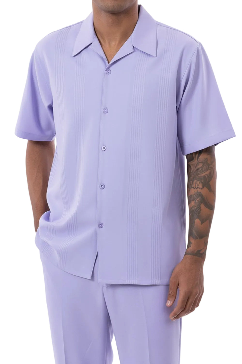 Person wearing a light purple short-sleeve shirt and pants set on a white background