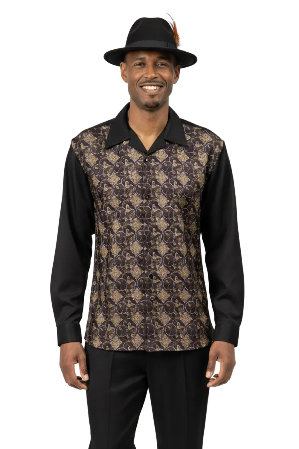 Man wearing a patterned shirt with a black collar and sleeves, standing against a white background