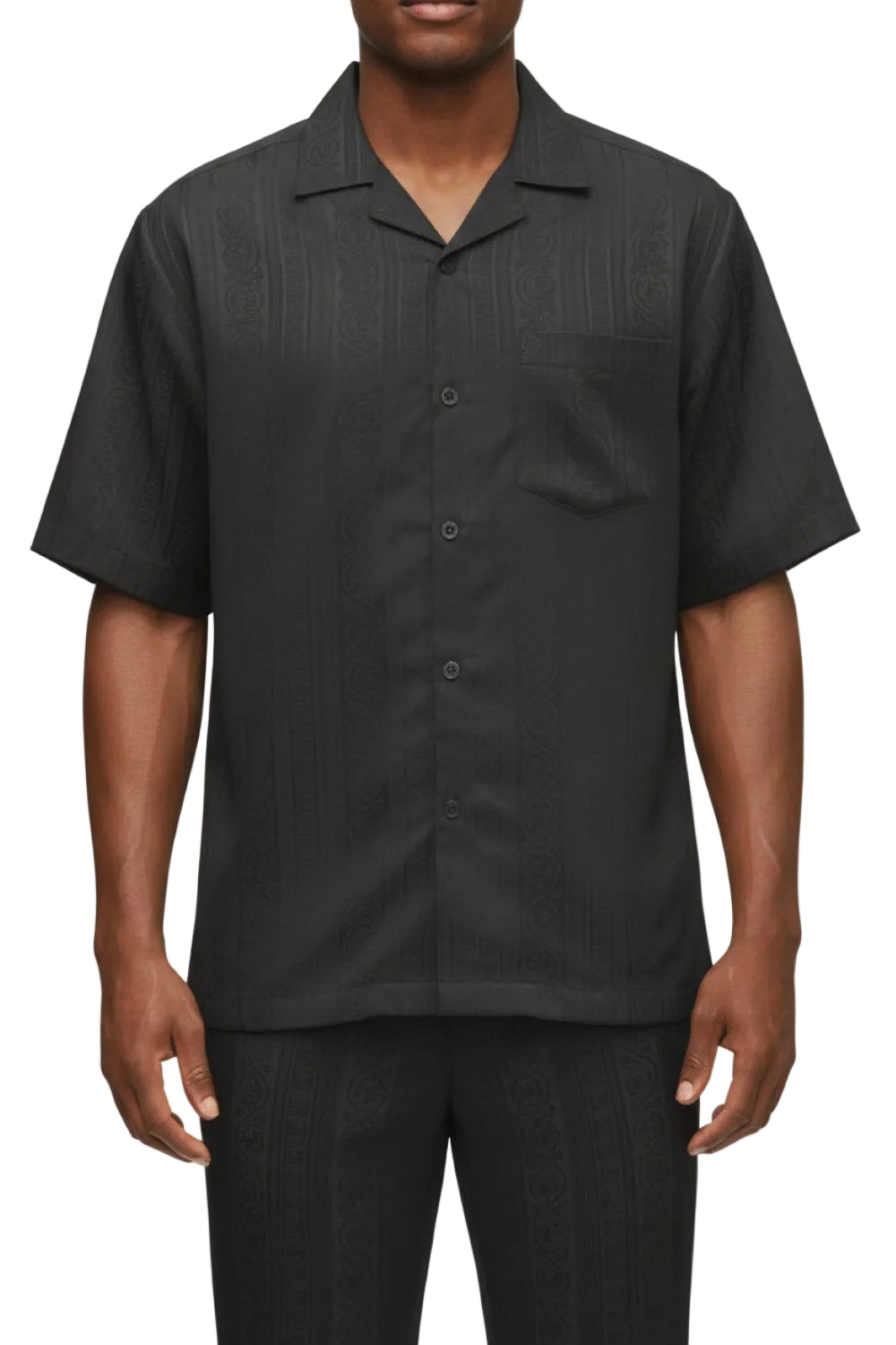 Man wearing a black short-sleeve button-up shirt on a white background