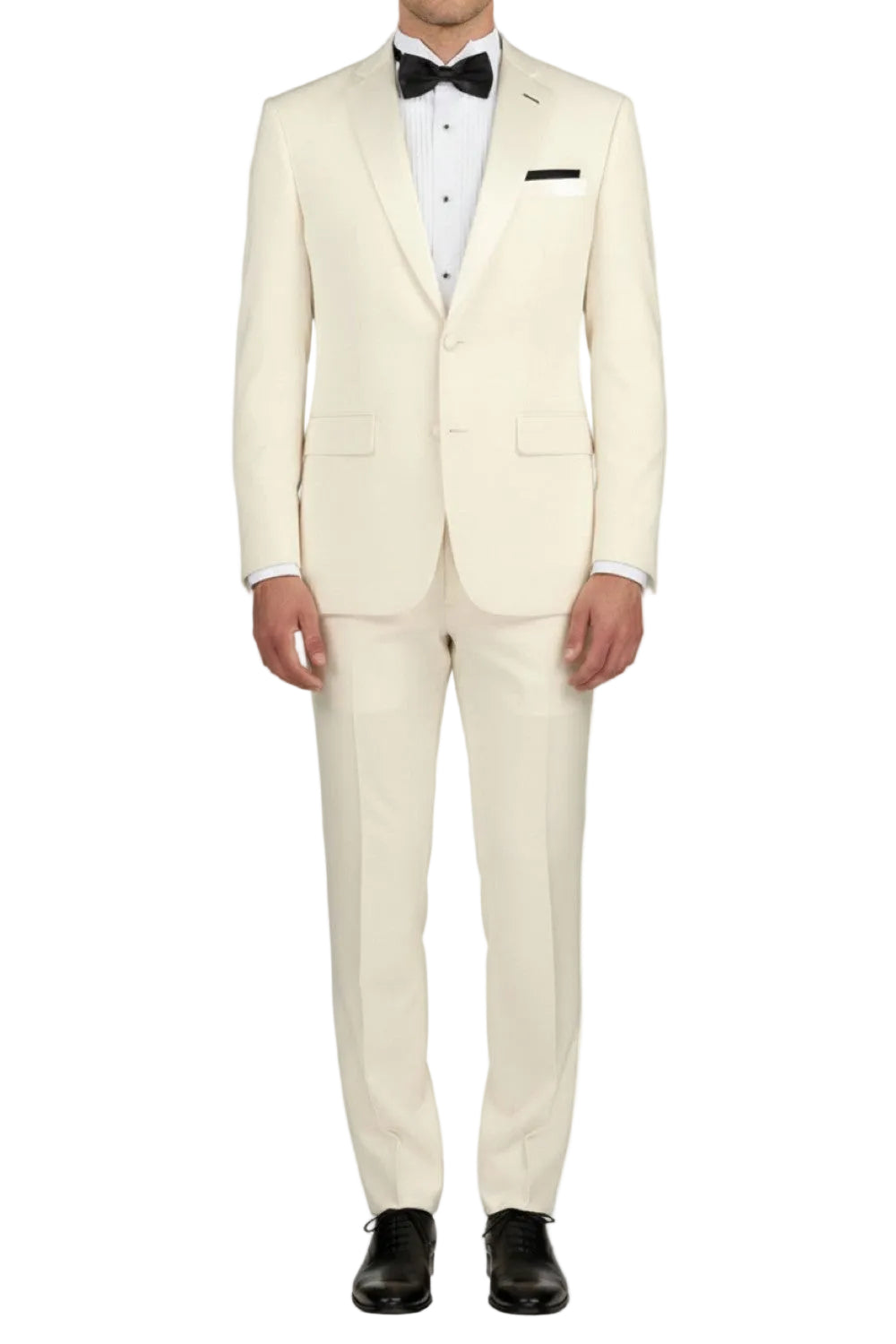 Ivory tuxedo with black bow tie and shoes on a white background