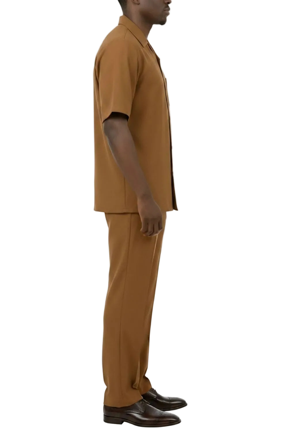 Man wearing a taupe outfit on a white background