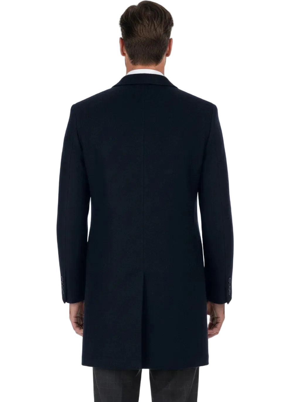 Man wearing a navy overcoat on a white background