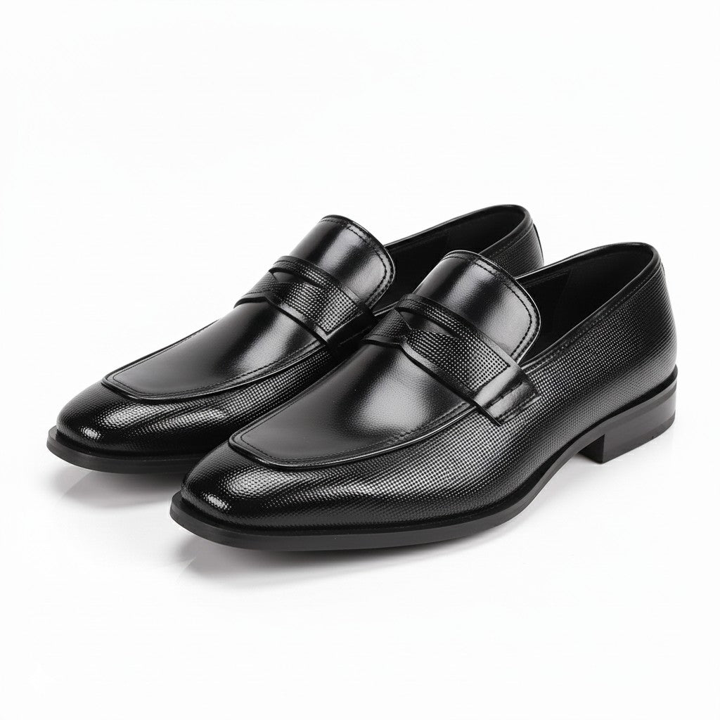 Black leather shoes with strap on a white background