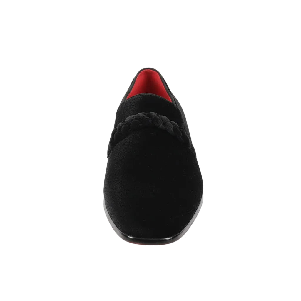 Black loafer shoe with red interior on a white background