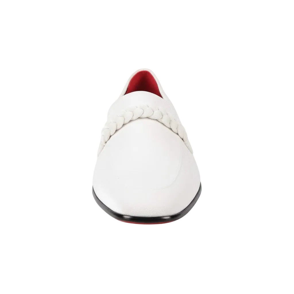 White shoe with red sole on a white background