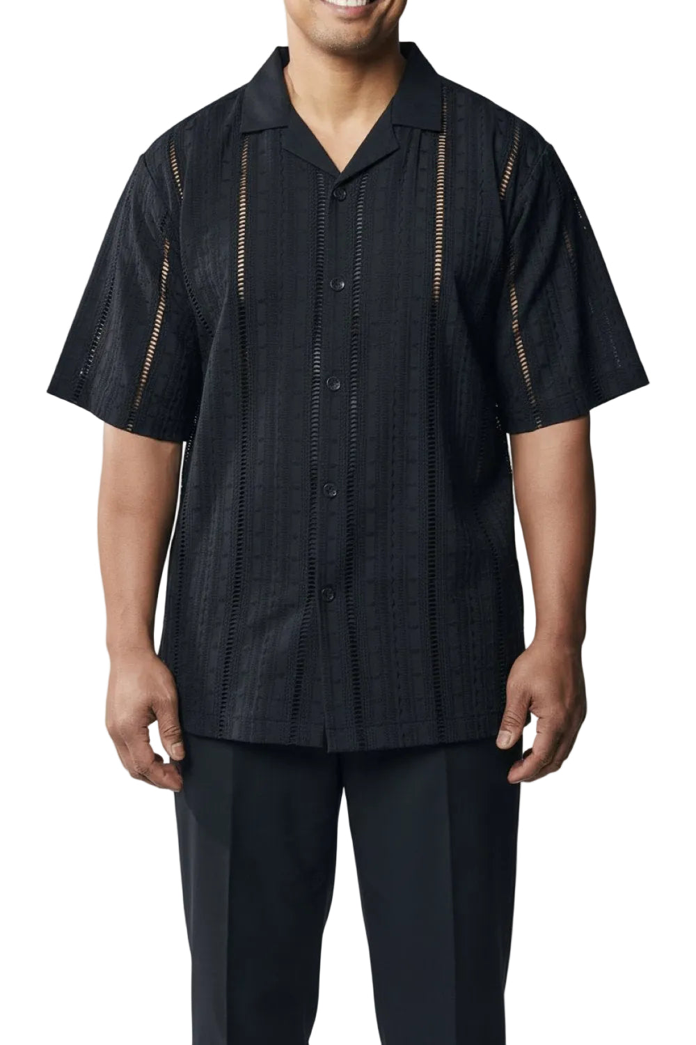 Man wearing a black short-sleeve shirt with decorative trim on a white background