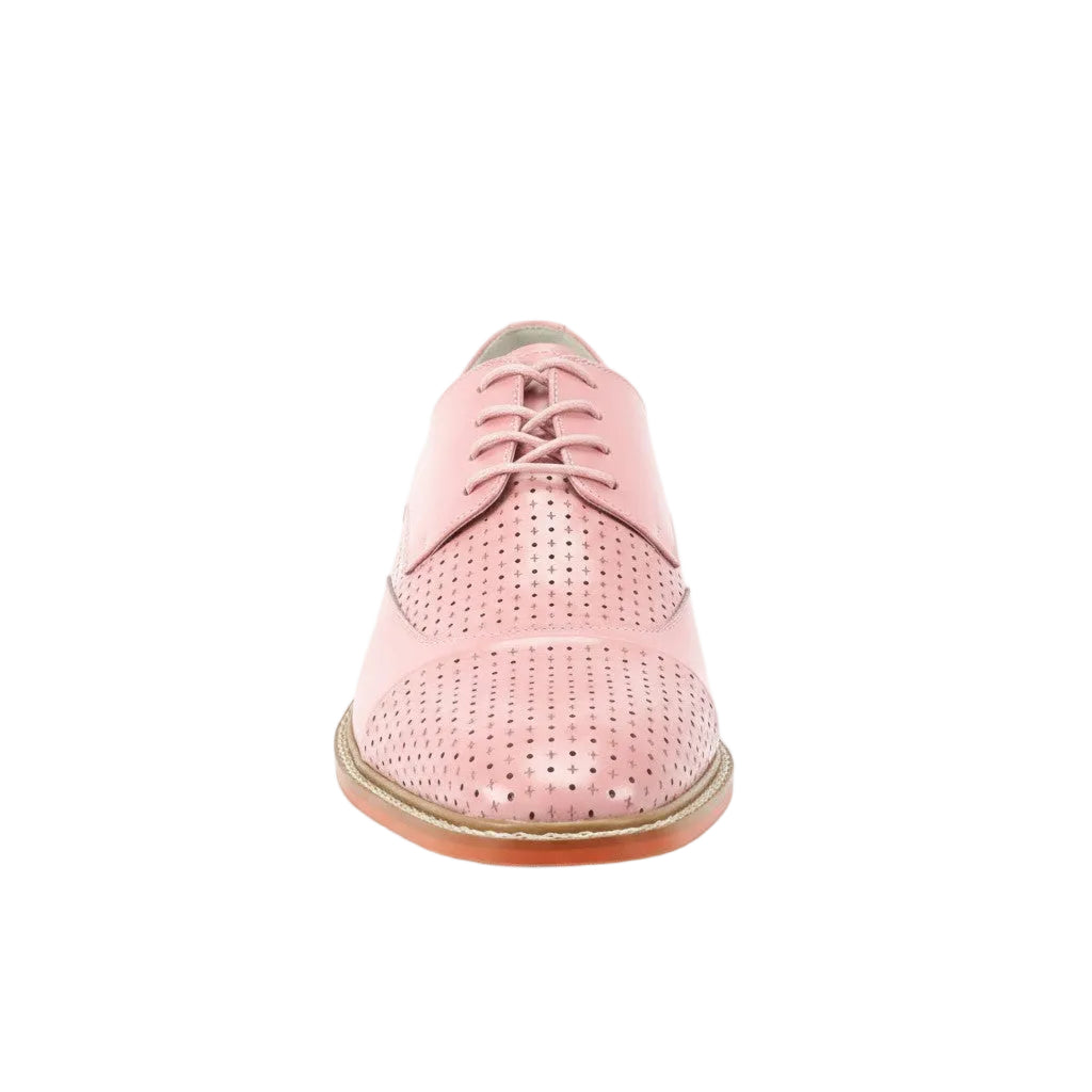 Pink perforated shoe on a white background