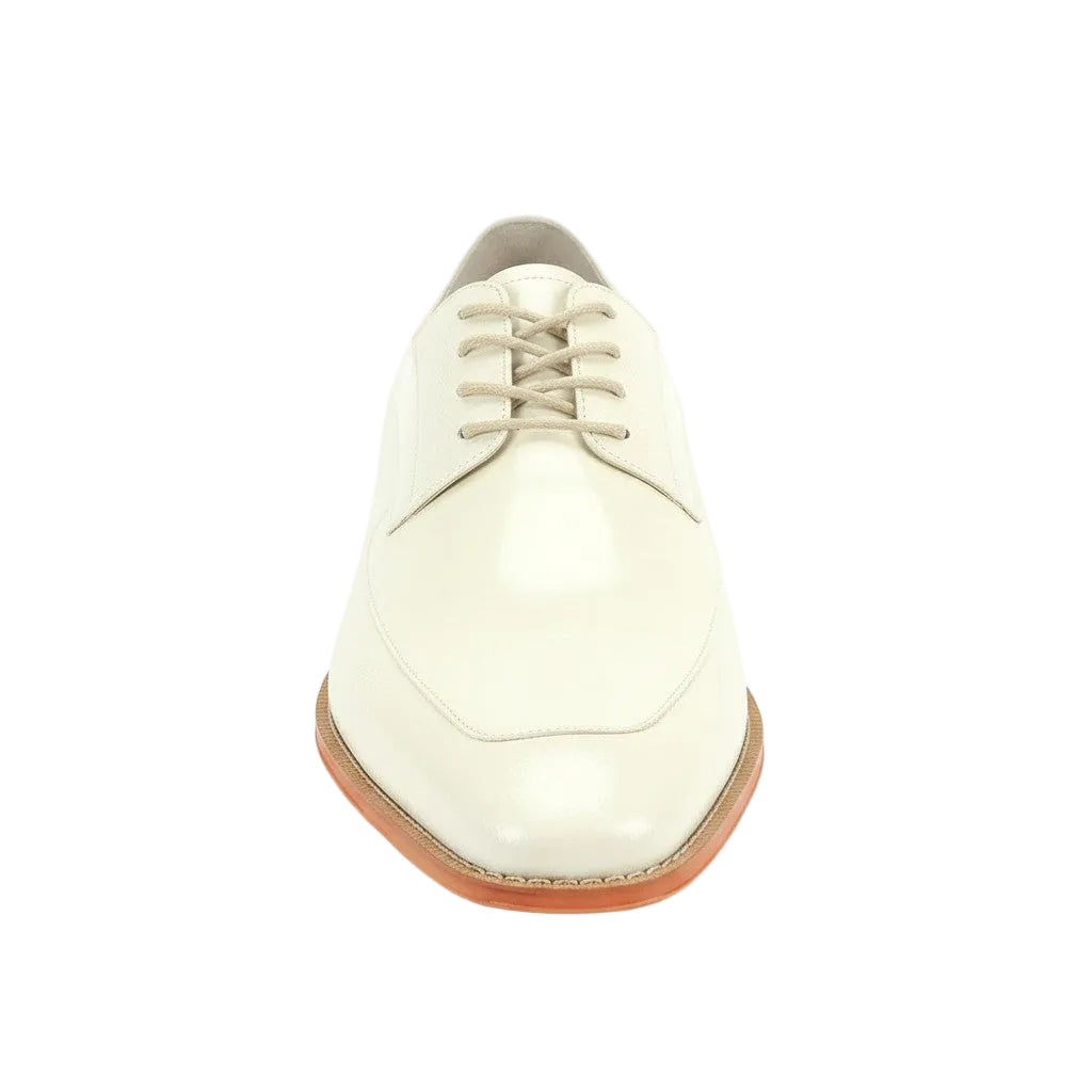 Cream leather shoe with brown sole on a white background
