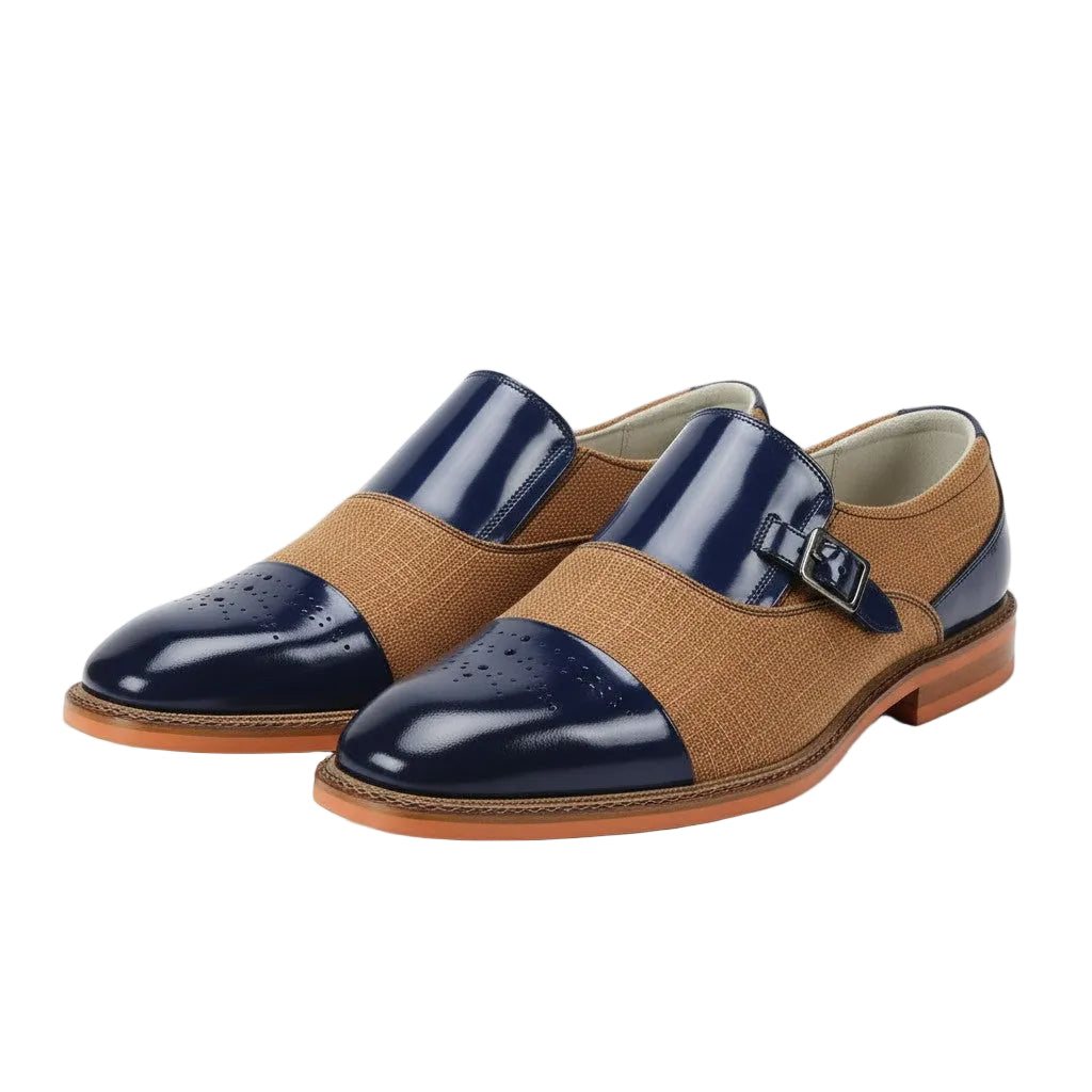 Pair of tan and cobalt blue shoes with a buckle on a white background