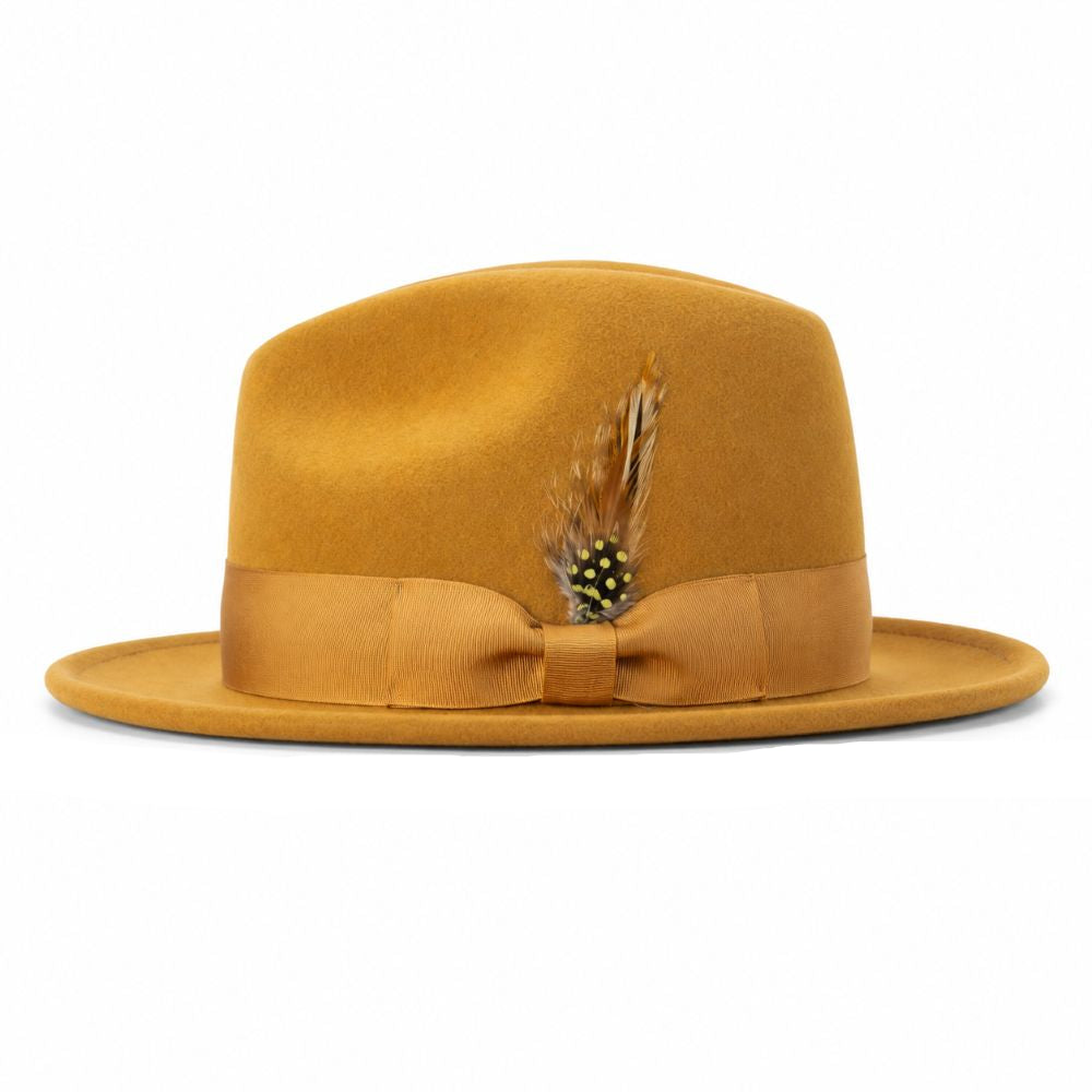 A mustard yellow felt fedora hat with a matching ribbon band, bow, and a decorative feather accent, shown against a plain white background.
