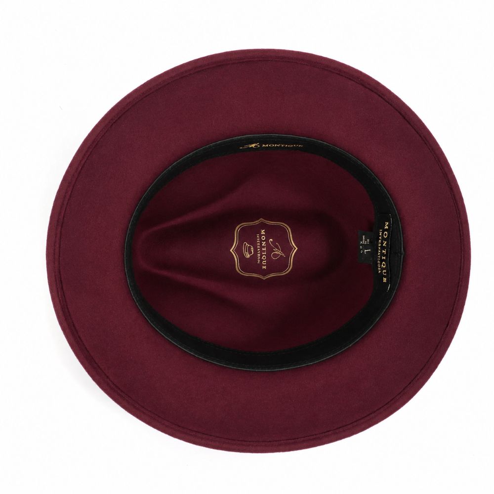 Interior view of wine wool felt wide-brim fedora with black sweatband and gold logo
