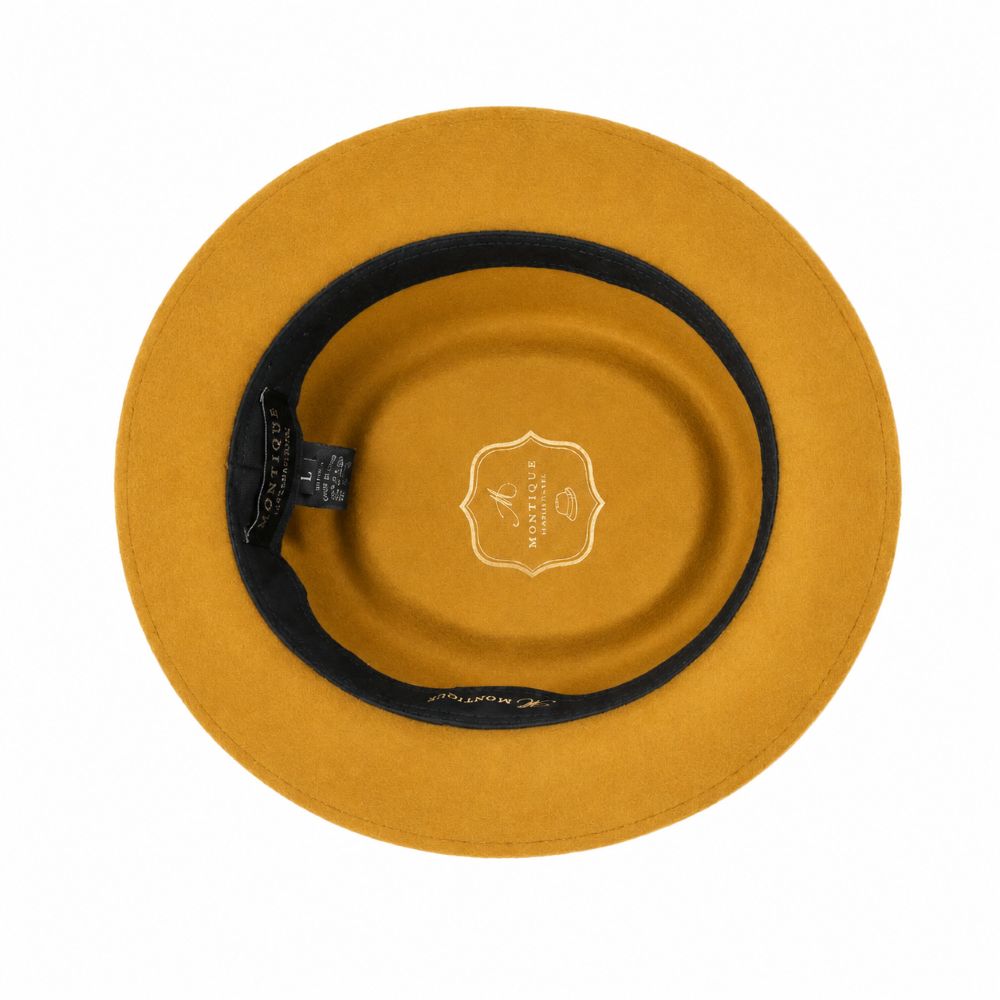 Tan hat with black band and visible brand logo on a white background