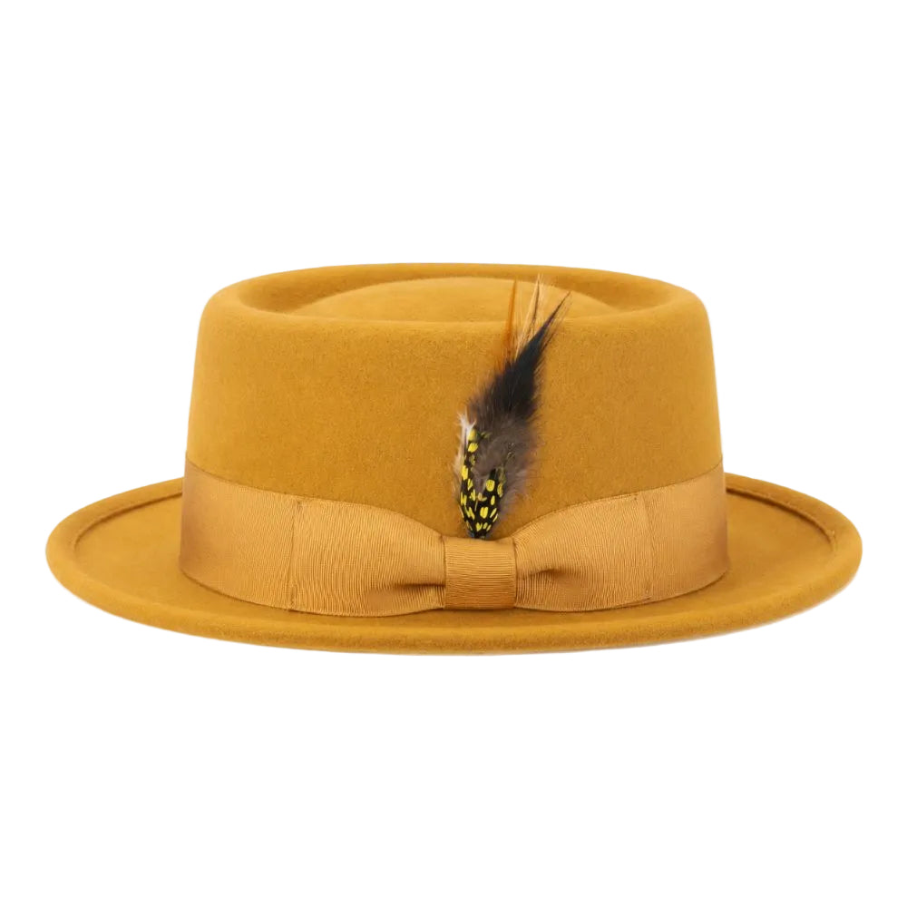 A mustard yellow felt fedora hat with a matching ribbon band and bow, decorated with a feather accent, shown against a plain white background.