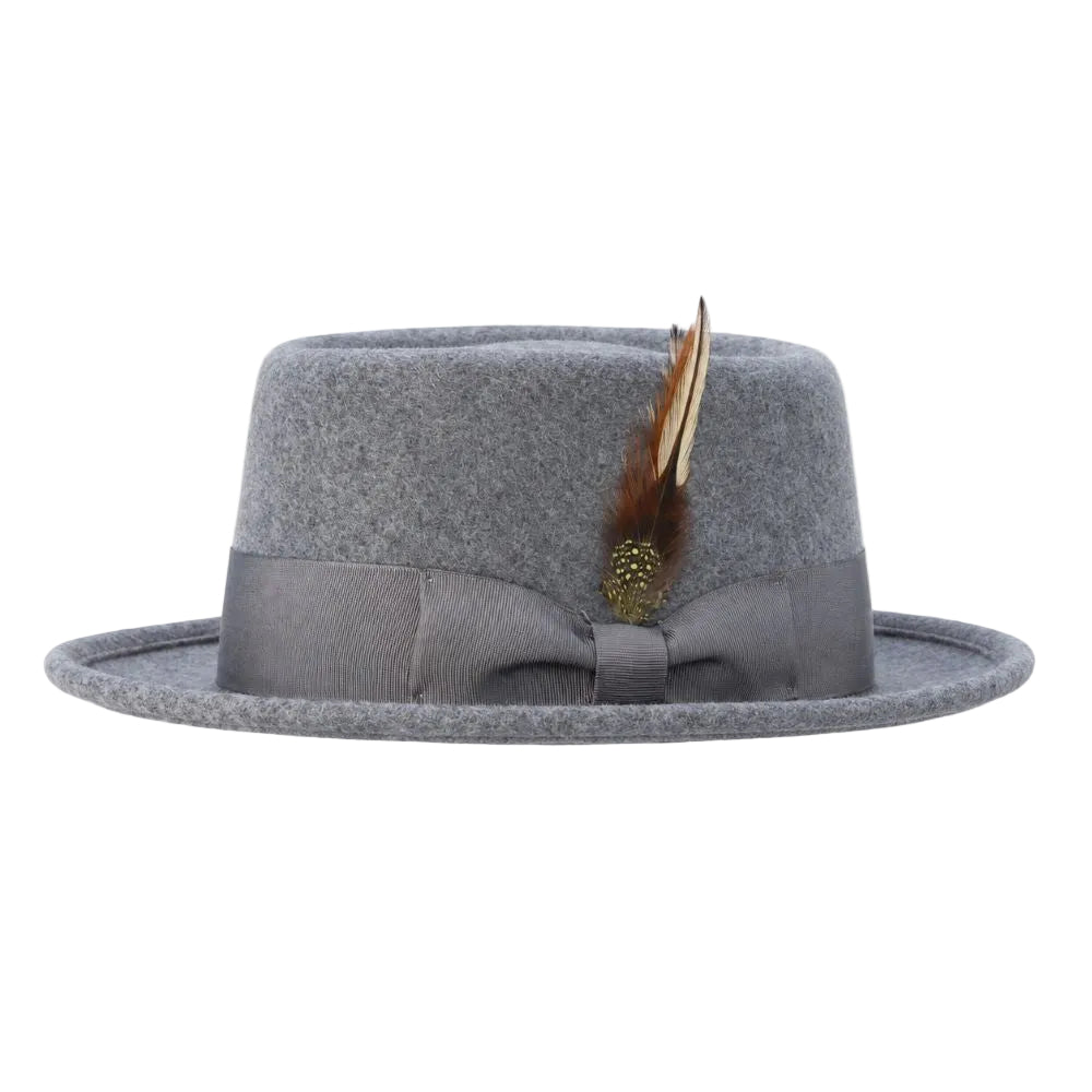 A gray felt fedora hat with a matching gray ribbon band and bow, decorated with a brown and cream feather and a small gold pinecone ornament, shown against a plain white background.
