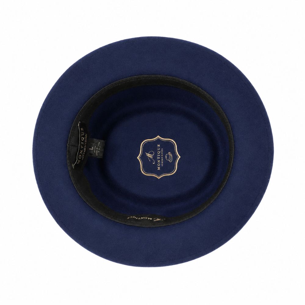 Top-down view of a navy blue felt hat with a black inner band and a gold embroidered crest on the inside crown, shown on a white background.