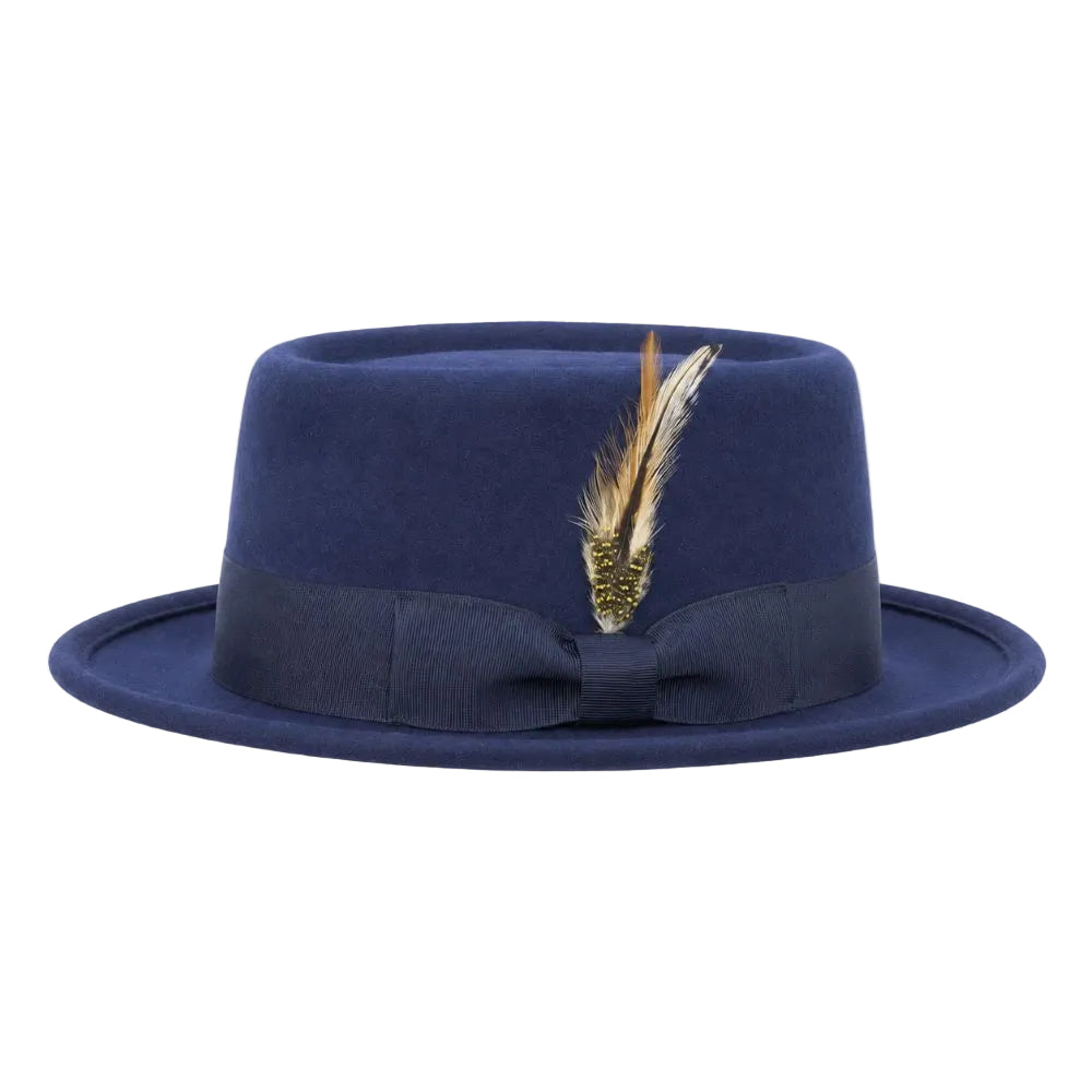 A navy blue felt fedora hat with a matching navy blue ribbon band and bow, decorated with a brown and gold feather, shown against a plain white background.