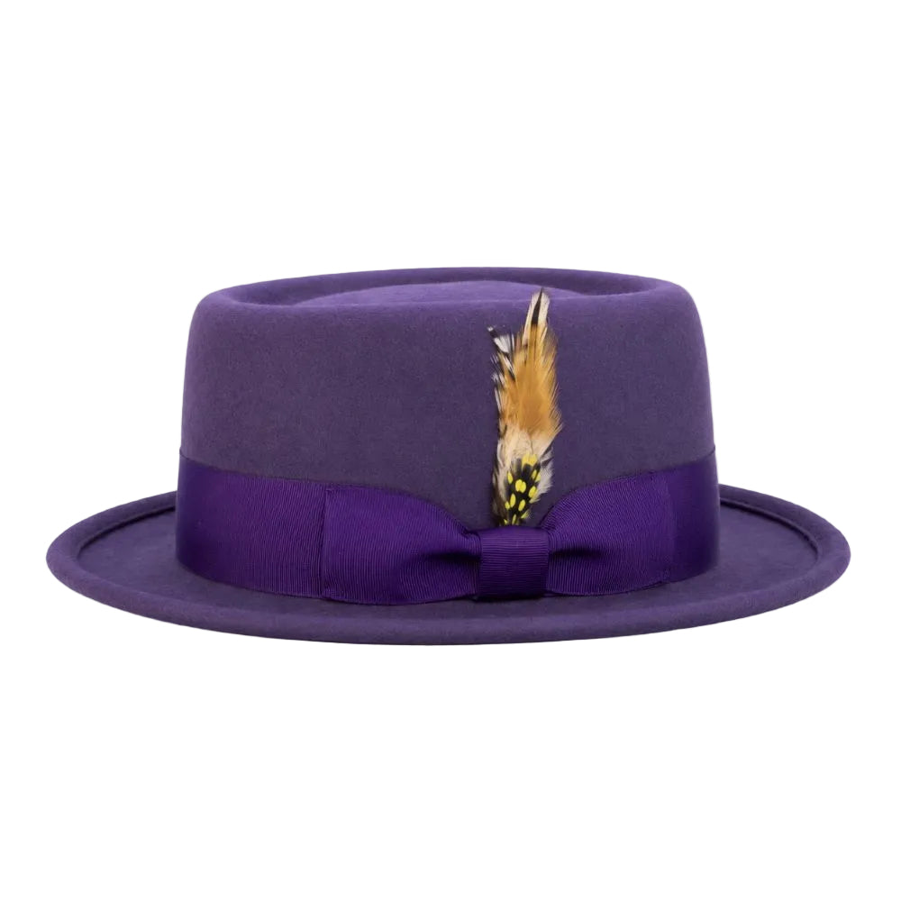 A purple felt fedora hat with a matching purple satin band, bow, and a decorative brown feather with yellow and black speckles, shown against a plain white background.