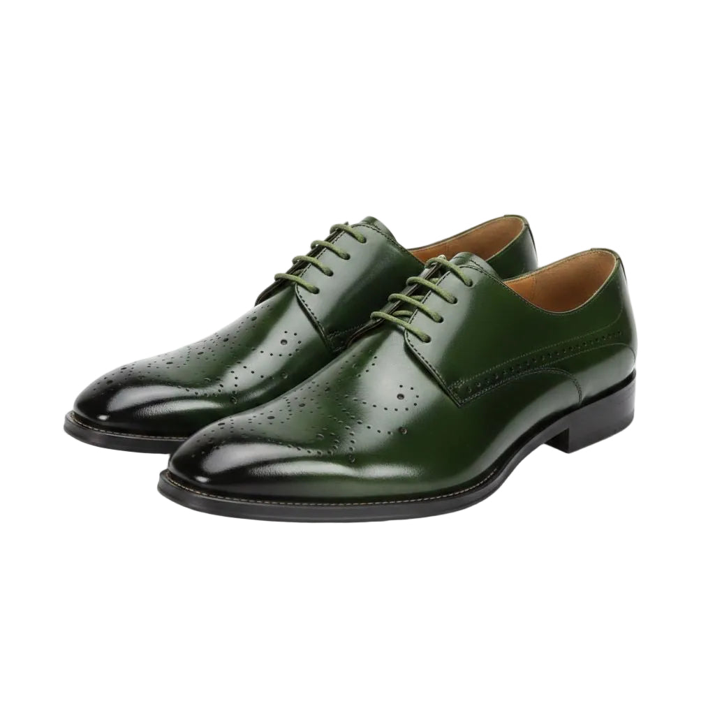 Green leather dress shoes on a white background