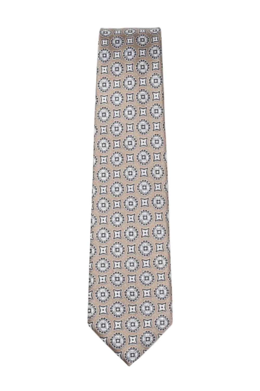 Beige tan tie with geometric medallion pattern laid flat