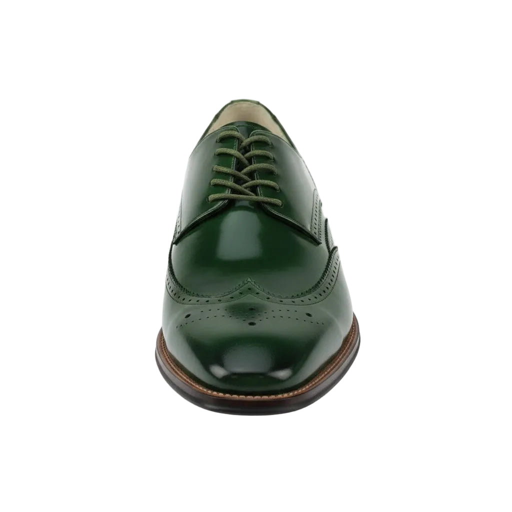 Green leather dress shoe on a white background