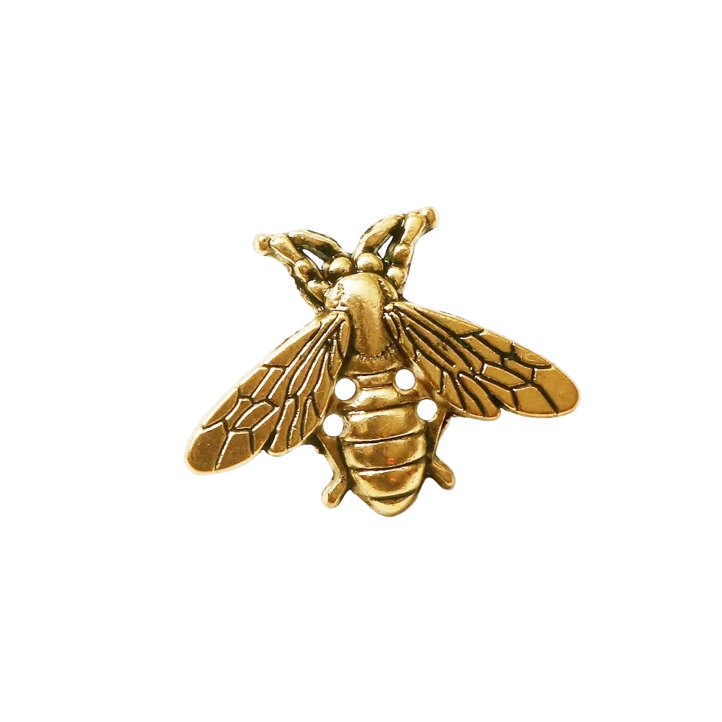 Gold bee-shaped pendant on a white background