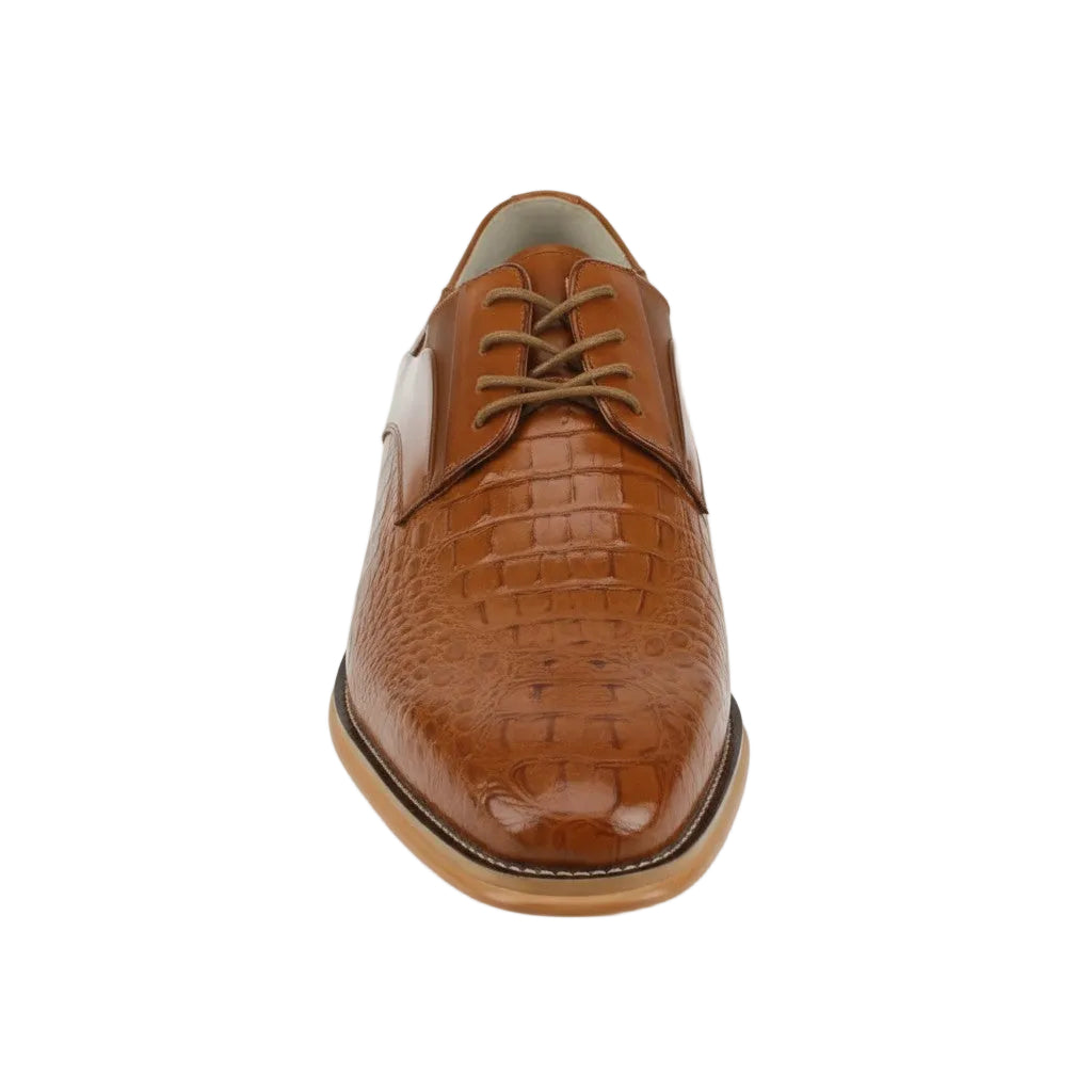 Tan leather dress shoe on a white background