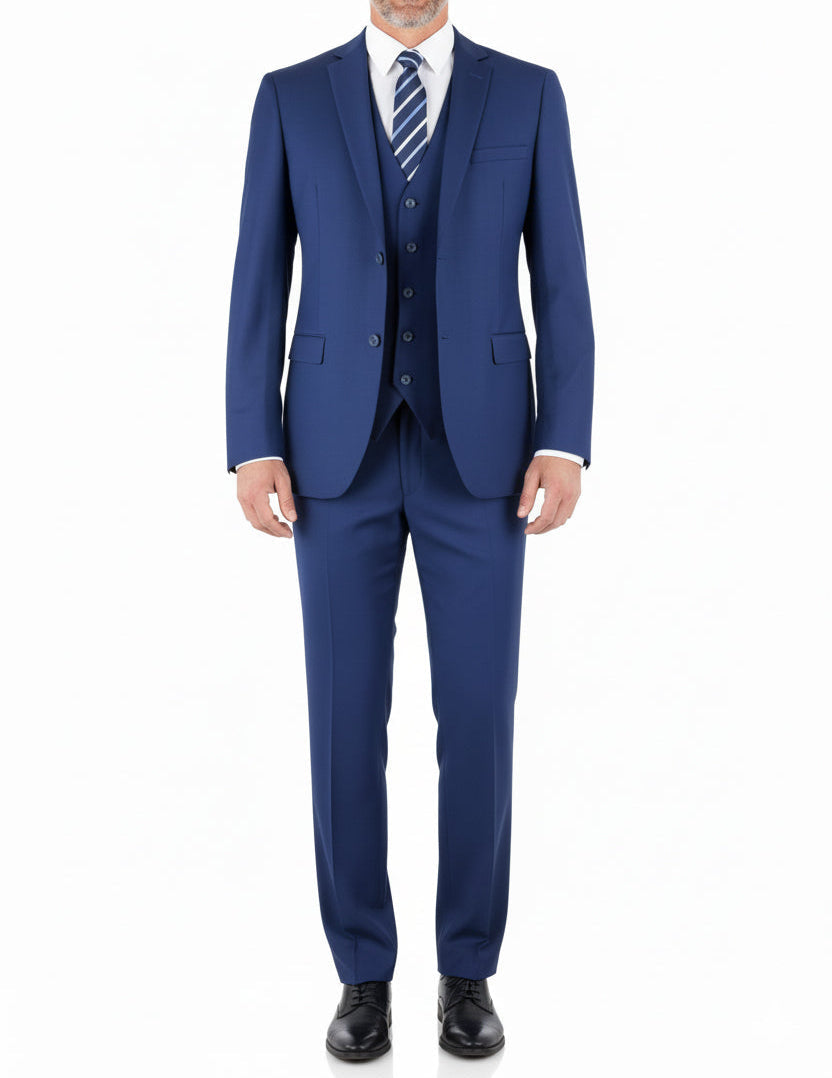 Detail shot: Maeza dark blue regular fit suit pants and a sophisticated tie on a distinguished gentleman.