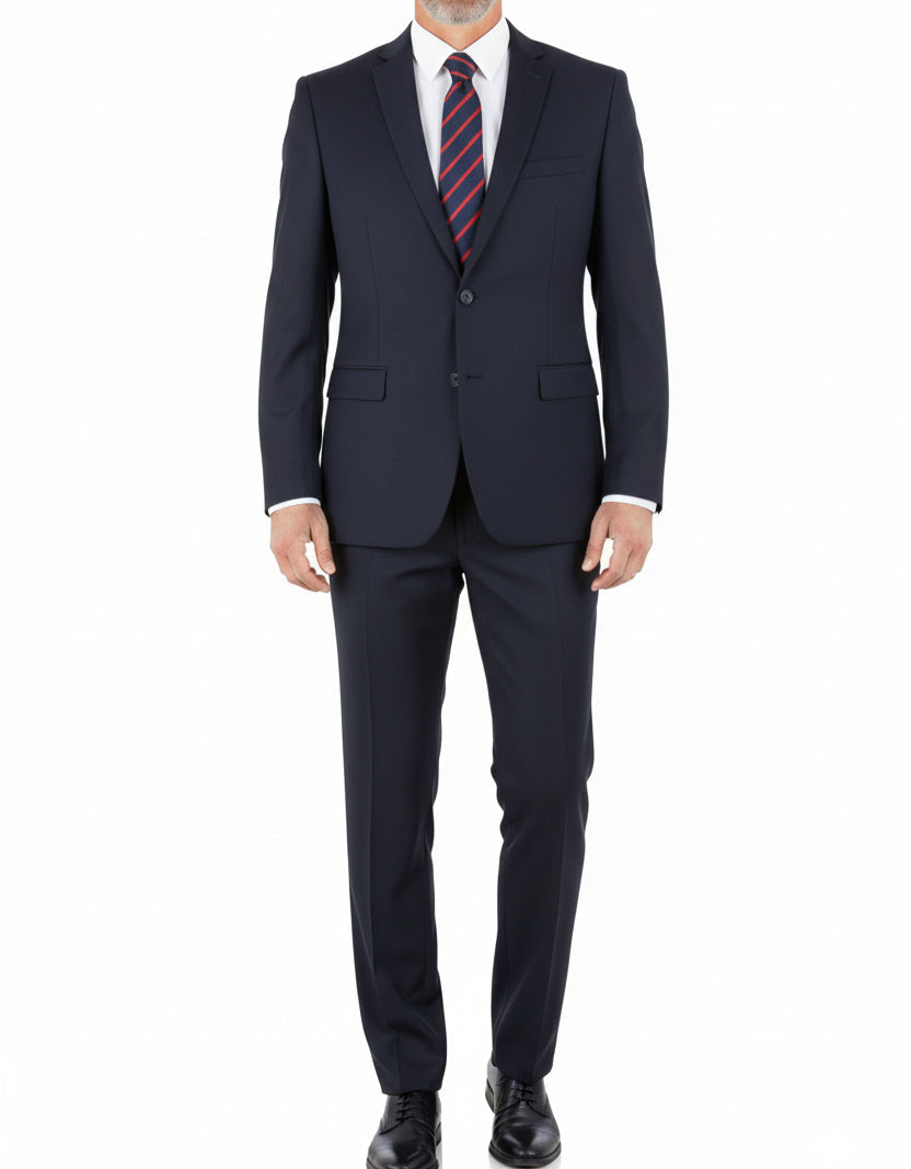 Man wearing a dark blue suit with a striped tie on a white background