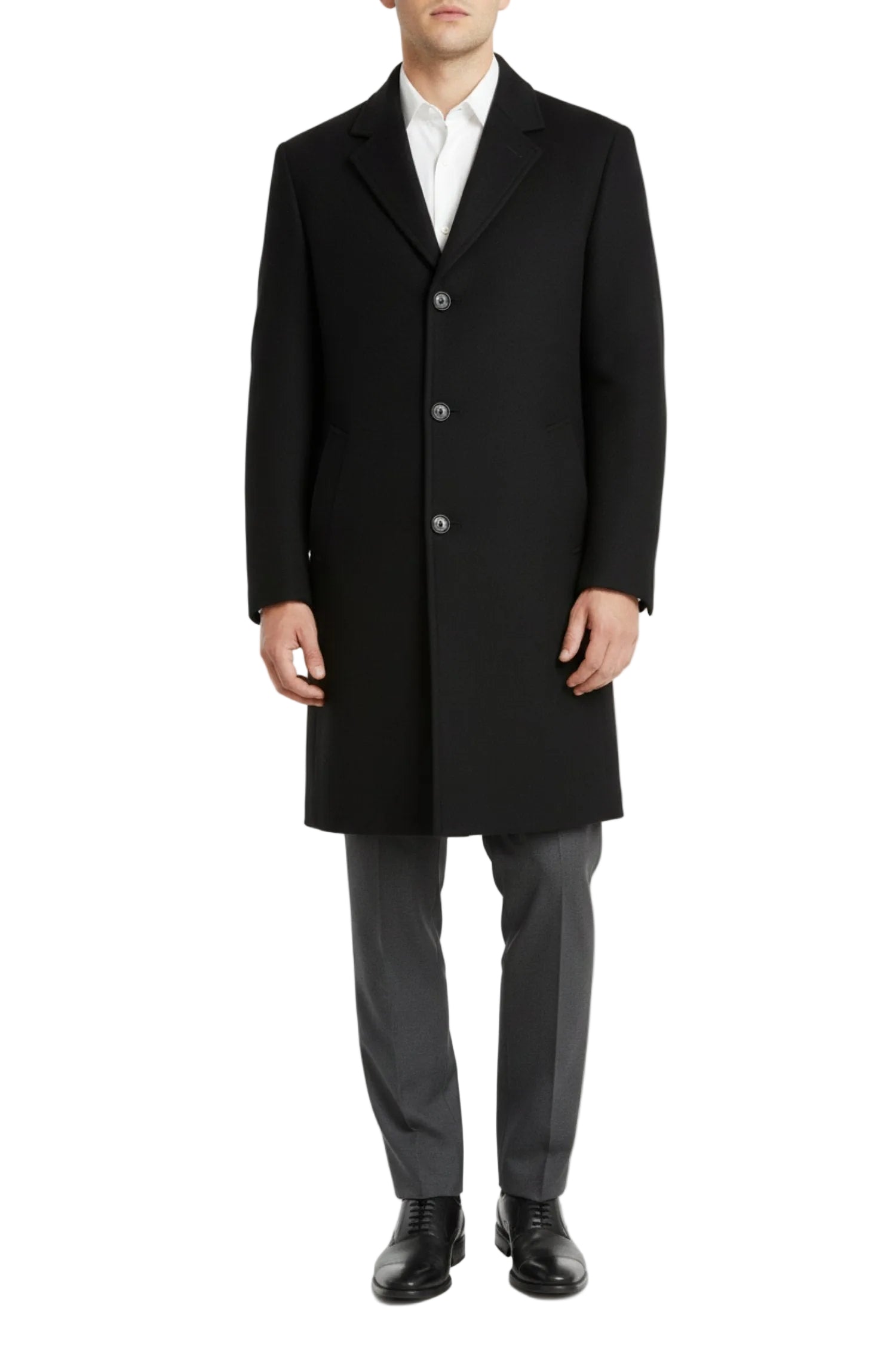 Man wearing a black overcoat on a white background