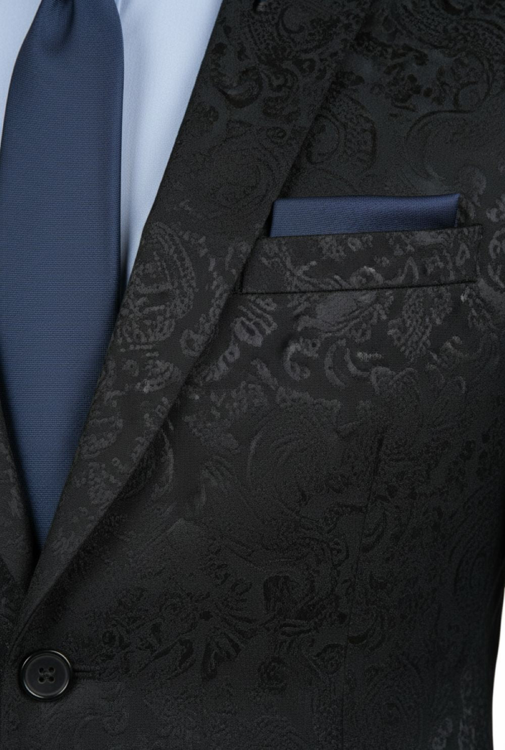 Black paisley suit jacket with a blue tie and pocket square.